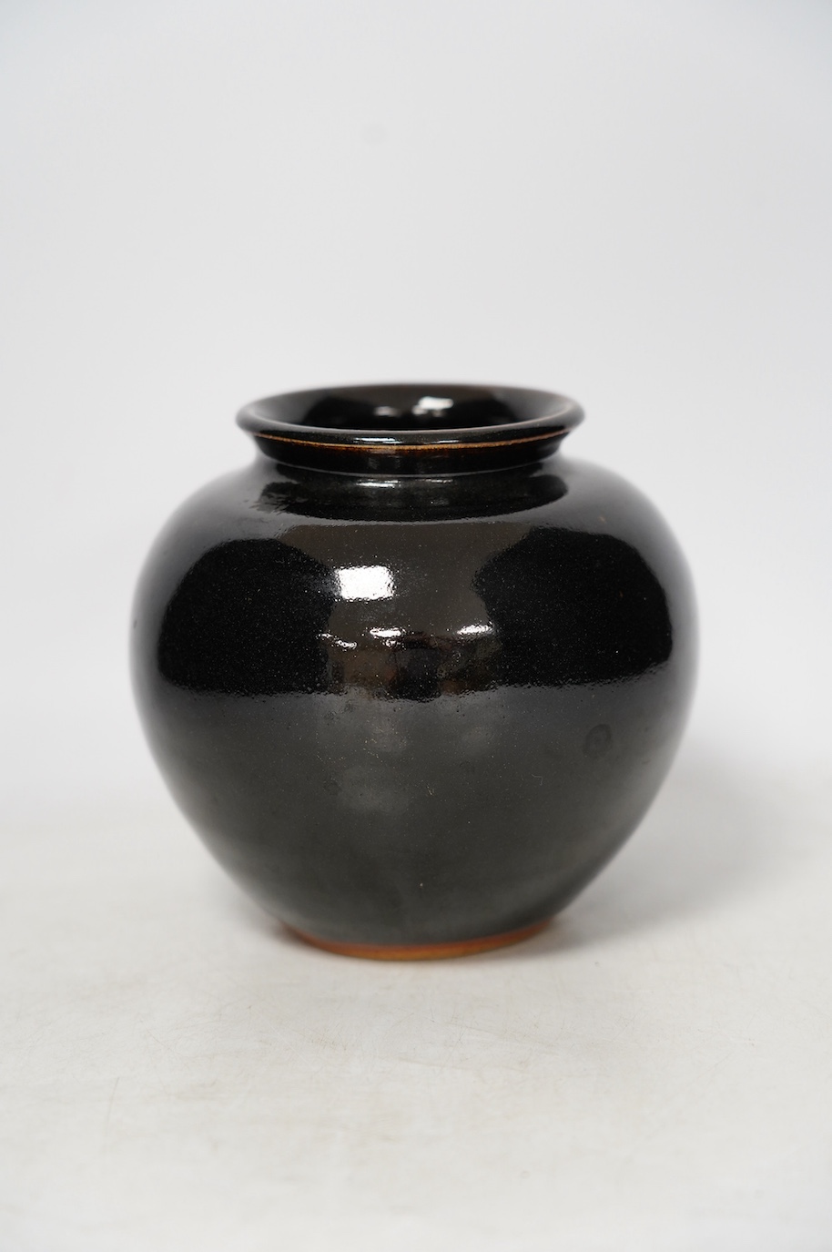 Ursula Mommens (1908-2010), a studio pottery glazed stoneware vase, stamped to foot rim, 14.5cm high. Condition - good